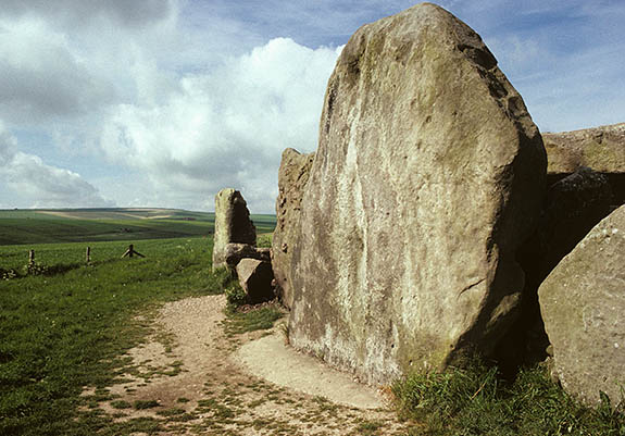 ENG: South West Region, Wiltshire, North Wessex Downs AONB, Avebury, West Kennet, West Kennet Long Barrow, near Avebury. Neolithic burial chamber (c. 3200BC) [Ask for #136.077.]
