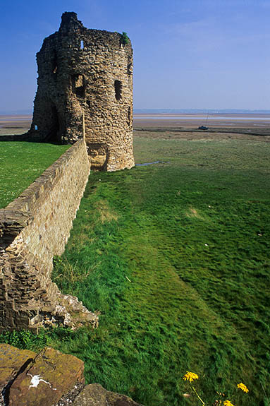 WAL: Flintshire County, The Dee Coast, Flint, Flint Castle. Corner towers and (mainly demolished) southern curtain wall; Dee Estuary (Sands of Dee) in bkgd [Ask for #246.104.]