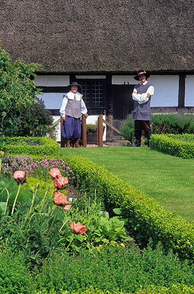 ENG: West Midlands Region, Staffordshire, The Trent Valley, Stafford, Izaak Walton Cottage, Museum staff Peter Sadler and Bruce Braithwaite in period costume in front of the cottage [Ask for #246.323.]