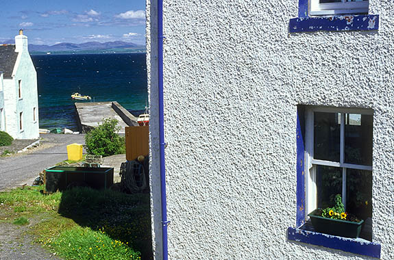 SCO: Argyll & Bute , Inner Hebrides, Islay, Port Charlotte, Old fishermen's cottages line the waterfront of this small village on Loch Indaal [Ask for #246.542.]
