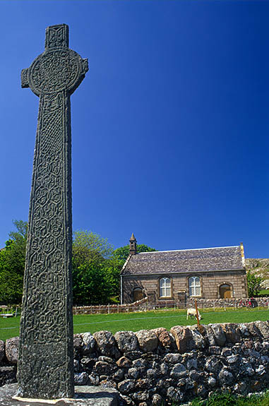 SCO: Argyll & Bute , Inner Hebrides, off Mull, Isle of Iona, Baile Mor (village). MacLean's Cross, 15th C. Celtic Cross, by the 19th C parish church (designed by Telford) [Ask for #246.616.]