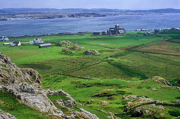 SCO: Argyll & Bute , Inner Hebrides, off Mull, Isle of Iona, Dun I. View from large rock outcrop at north end of island, towards the restored 13th C abbey [Ask for #246.631.]