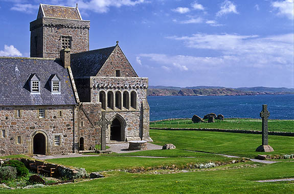 SCO: Argyll & Bute , Inner Hebrides, off Mull, Isle of Iona, Iona Abbey. Entrance to restored 13th C abbey; St Martin's Cross (8th C Celtic Cross) on rt [Ask for #246.645.]