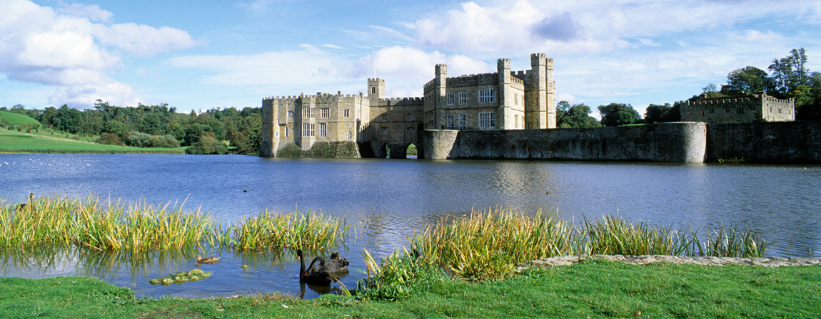 ENG: Kent , The Medway Valley, Leeds Castle and Gardens, Moat and Castle. Wide view of entire castle and moat, with black swans [Ask for #248.369.]