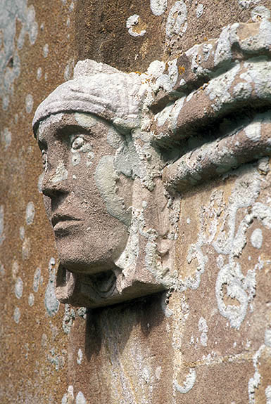 ENG: Hampshire , The North Downs, Steventon (Jane Austin's Birthplace), Steventon Church. Carving on the front entrance of this 13th c. village church, little changed from when Jane Austin's father was the rector [Ask for #253.063.]