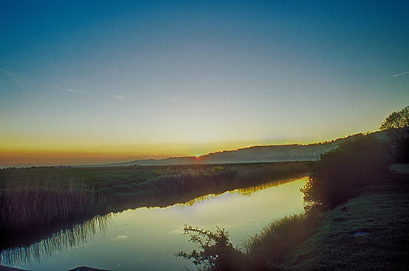 ENG: South East Region, Kent, Romney Marsh, Romney Marsh Beaches, Dymchurch, Sunset view over the marsh at Botolphs Bridge, a short distance inland from town. [Ask for #256.450.]