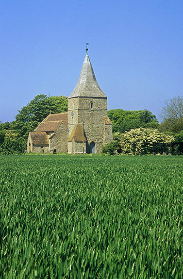 ENG: South East Region, Kent, Romney Marsh, Romney Marsh's Interior, St. Mary-in-Marsh, Village church viewed across fields. [Ask for #256.521.]