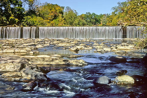 North Carolina: Lower Piedmont Region, Alamance County, Haw River Area, Glencoe Village, Mill dam on the Haw River, powering a 19th century textile mill; it was reconstructed in the 20th century. The Mountains To Sea Trail passes here. [Ask for #263.168.]