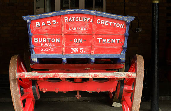 ENG: West Midlands Region, Staffordshire, The Trent Valley, Burton-on-Trent, Town Center, National Brewery Centre.  Red delivery wagon from the 19th c. [Ask for #270.041.]