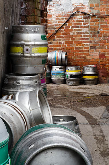 ENG: West Midlands Region, Staffordshire, The Trent Valley, Burton-on-Trent, Burton Bridge Brewery, Town Center, Aluminum casks behind the brewery, waiting to be filled [Ask for #270.240.]