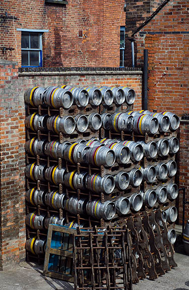 ENG: West Midlands Region, Staffordshire, The Trent Valley, Burton-on-Trent, Burton Bridge Brewery, Town Center, Casks stacked behind the brewery, waiting to be shipped [Ask for #270.243.]