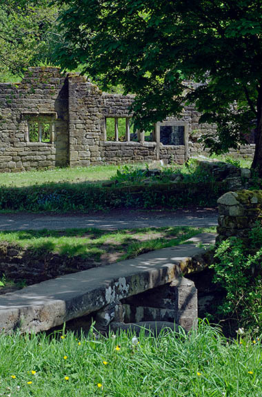 ENG: Lancashire , The Pennines, Pendle, Wycoller Country Park. Clapper bridge by ruinous18th c. Wycoller Hall, the model for Ferndean Manor in "Jane Eyre". The Bronte Way and Pennine Bridleway pass. [Ask for #270.305.]