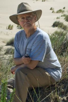 OR: South Coast Region, Coos County, Northern Coastal Area, Oregon Dunes National Recreation Area, Self-portrait of the photographer, Jim Hargan, on a remote dune. [Ask for #274.A88.]